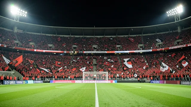 Imagem gerada por IA: Estádio lotado à noite antes de Flamengo e Estudiantes se enfrentarem pela semifinal da Libertadores.
