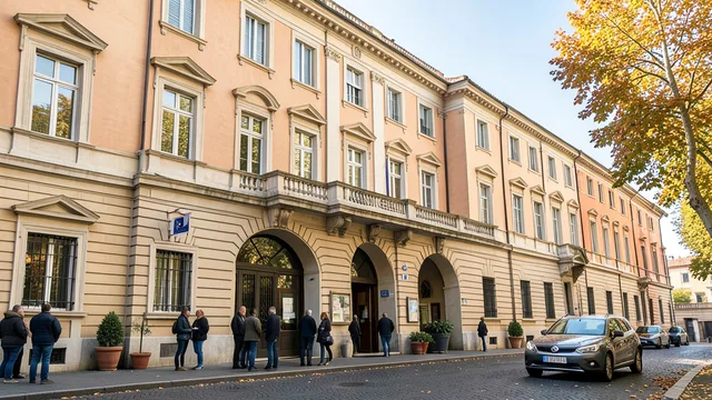 Imagem gerada por IA: Fachada do Hospital Agostino Gemelli, em Roma, com visitantes perto da entrada.